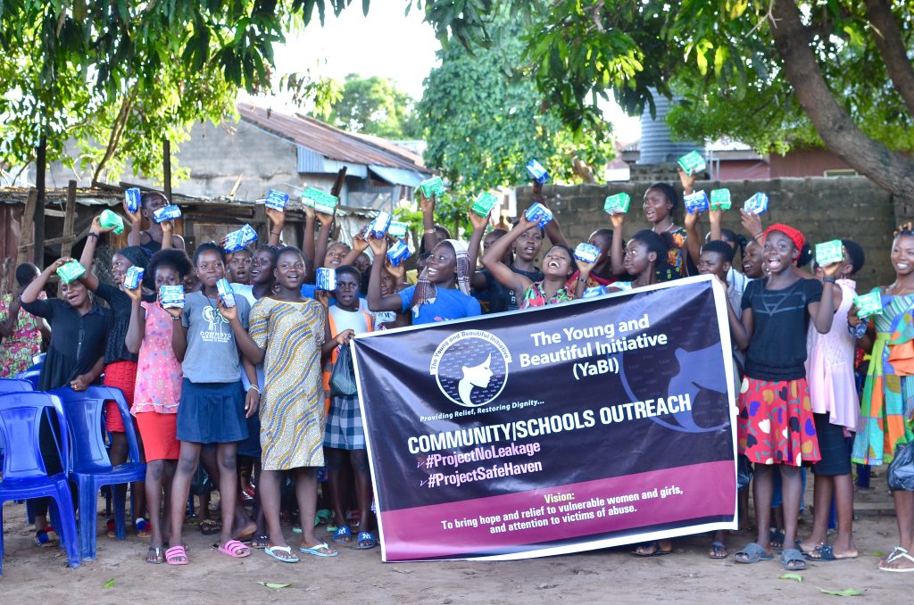 School Kids Holding the Yabi Banner